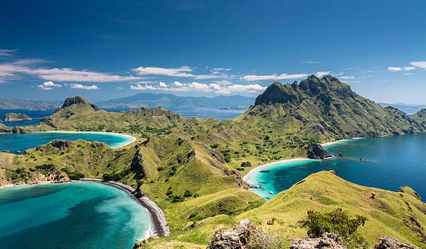 Aerial view of the island 'Pulau Padar' at the famous Komodo National Park in Indonesia. Komodo is world wide famous for the beautiful underwater life, the diving sites and the Komodo dragon. Secluded white sand beaches also spot the islands of the archipelago.
